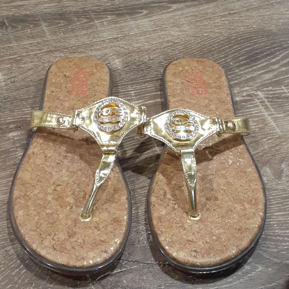 Micheal Kors gold diamond meddelion thong …